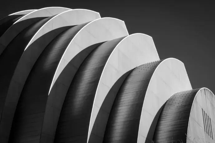 white spiral stairs in grayscale photography